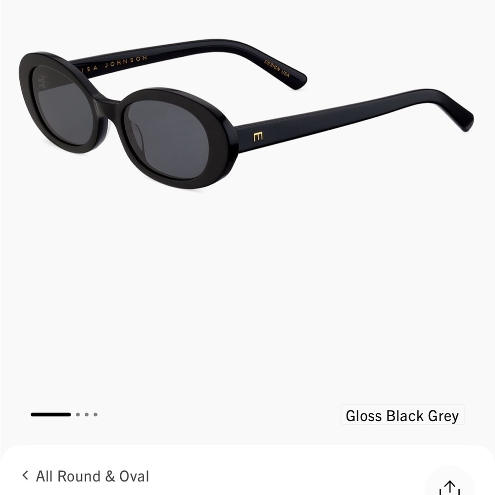 Elegant Black Oval Sunglasses by Elisa Johnson